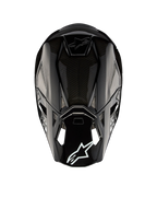 Alpinestars Supertech M10 Solid ECE 22.06, czarny błyszczący kask motocrossowy z karbonową skorupą, widok z tyłu z otworami wentylacyjnymi i logo Alpinestars, certyfikowany ECE