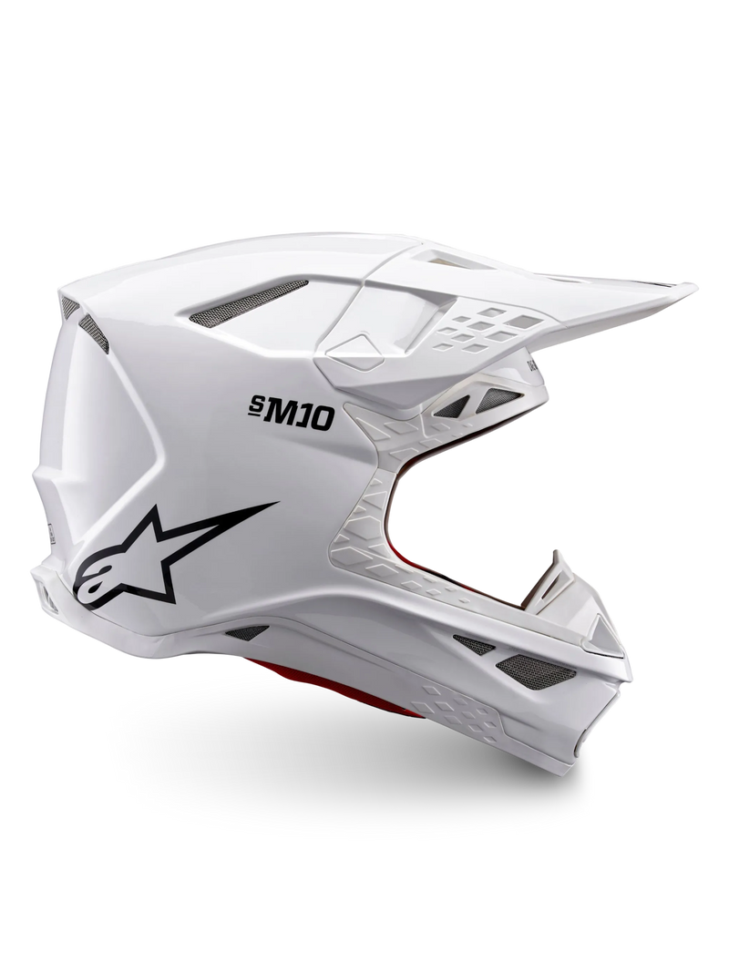 Alpinestars Supertech M10 Solid ECE 22.06, biały błyszczący kask motocrossowy, czarne logo, daszek i wentylowana konstrukcja pełnotwarzowa, certyfikowany ECE 22.06, widok z boku