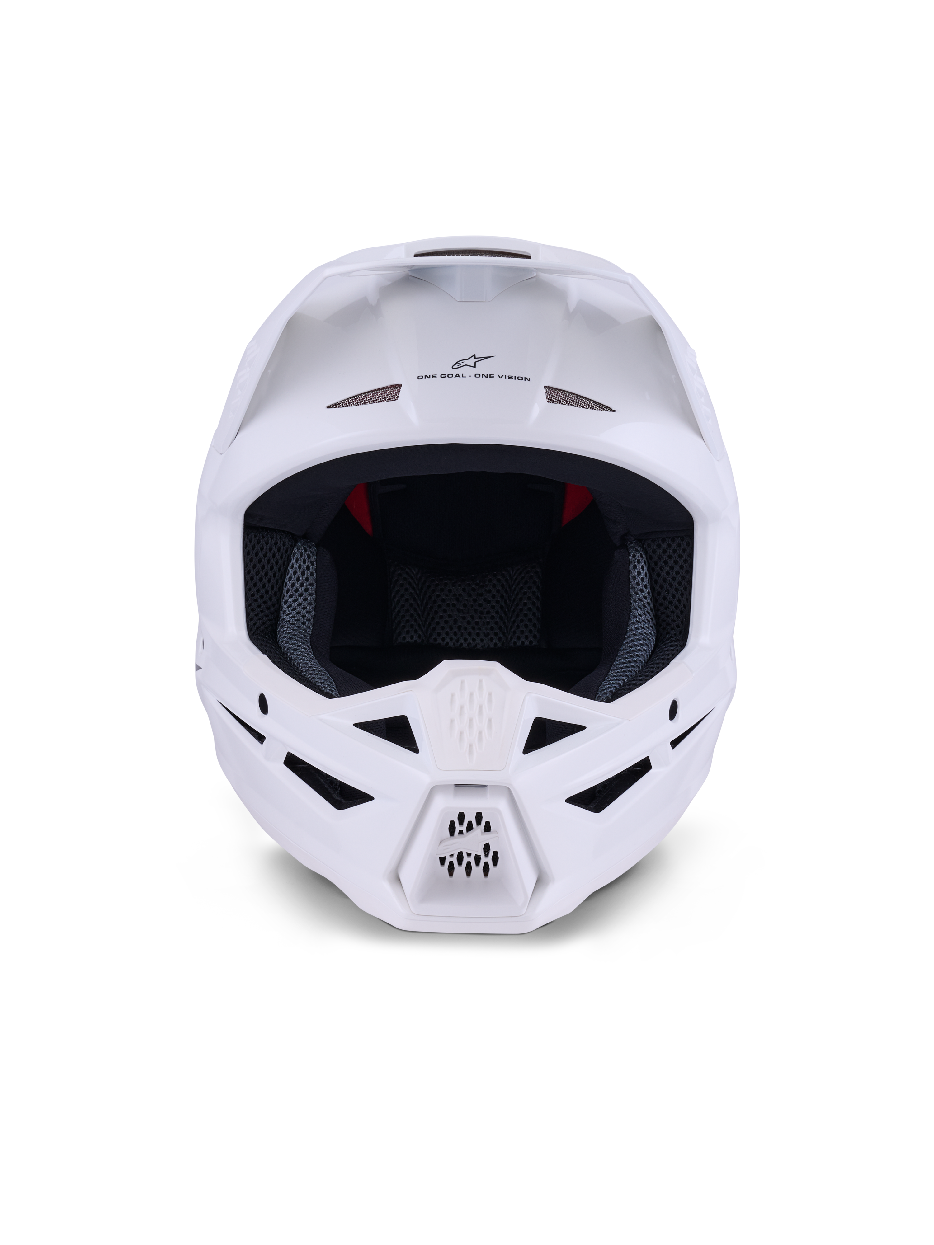 Alpinestars S-M3 Solid Helmet ECE 22.06, kask motocrossowy, biały z połyskiem, widok z przodu z licznymi wlotami wentylacyjnymi na szczęce i czole, smukła aerodynamiczna skorupa z daszkiem, branding „ONE GOAL – ONE VISION” i siateczkowa wyściółka wewnętrzna zapewniająca ochronę w wyścigach terenowych