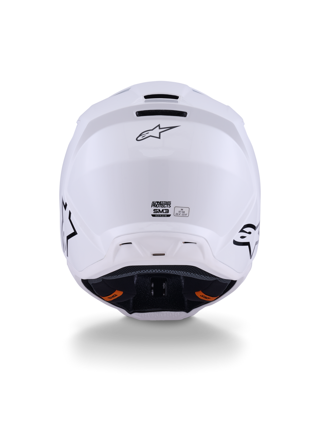 Alpinestars S-M3 Solid Helmet ECE 22.06, kask motocrossowy, biały błyszczący, widok z tyłu prezentujący wyloty wentylacyjne, logo Alpinestars i etykietę certyfikacji bezpieczeństwa, przeznaczony do jazdy terenowej