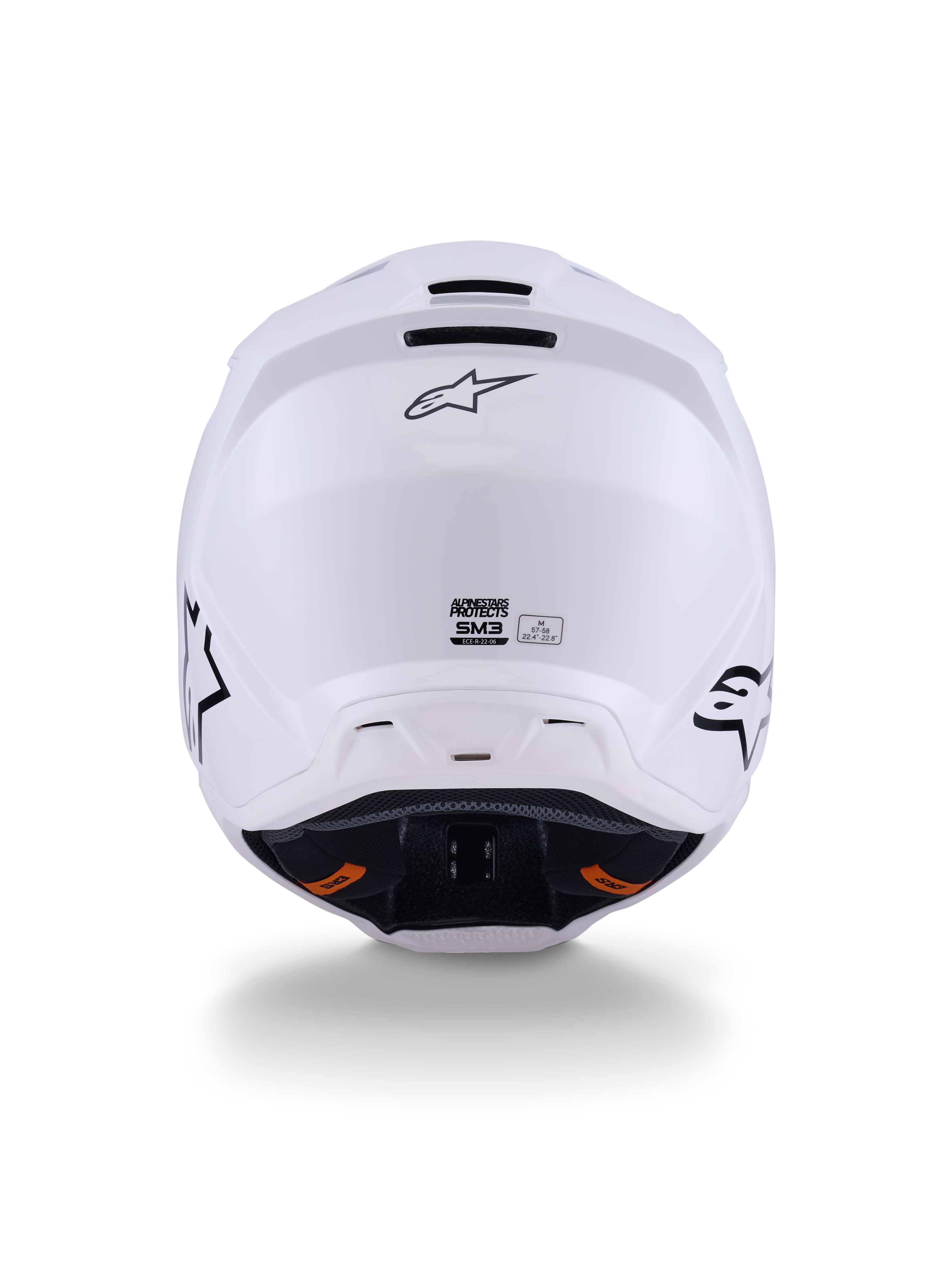 Alpinestars S-M3 Solid Helmet ECE 22.06, kask motocrossowy, biały błyszczący, widok z tyłu prezentujący wyloty wentylacyjne, logo Alpinestars i etykietę certyfikacji bezpieczeństwa, przeznaczony do jazdy terenowej