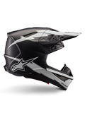Alpinestars Supertech M10 Ampress Helmet, kask motocrossowy, czarny i biały matowy, aerodynamiczny profil z grafikami białych błyskawic, liczne otwory wentylacyjne, przedłużony daszek, konstrukcja z włókna węglowego z matowym wykończeniem