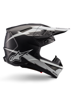 Alpinestars Supertech M10 Ampress Helmet, kask motocrossowy, czarny i biały matowy, aerodynamiczny profil z grafikami białych błyskawic, liczne otwory wentylacyjne, przedłużony daszek, konstrukcja z włókna węglowego z matowym wykończeniem