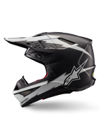 Alpinestars Supertech M10 Ampress Helmet, kask motocrossowy, czarno-biały matowy, widok z boku z wyrazistymi białymi grafikami w stylu błyskawic, aerodynamiczna skorupa z widocznymi otworami wentylacyjnymi i daszkiem, zaawansowana ochrona off-road