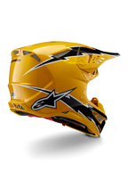 Alpinestars Supertech M10 Ampress Helmet, kask motocrossowy, czarno-żółty z połyskiem, żółte wykończenie o wysokim połysku z czarno-białą grafiką w stylu błyskawic, widok z tyłu pod kątem trzech czwartych ukazujący aerodynamiczną skorupę i zintegrowane otwory wentylacyjne