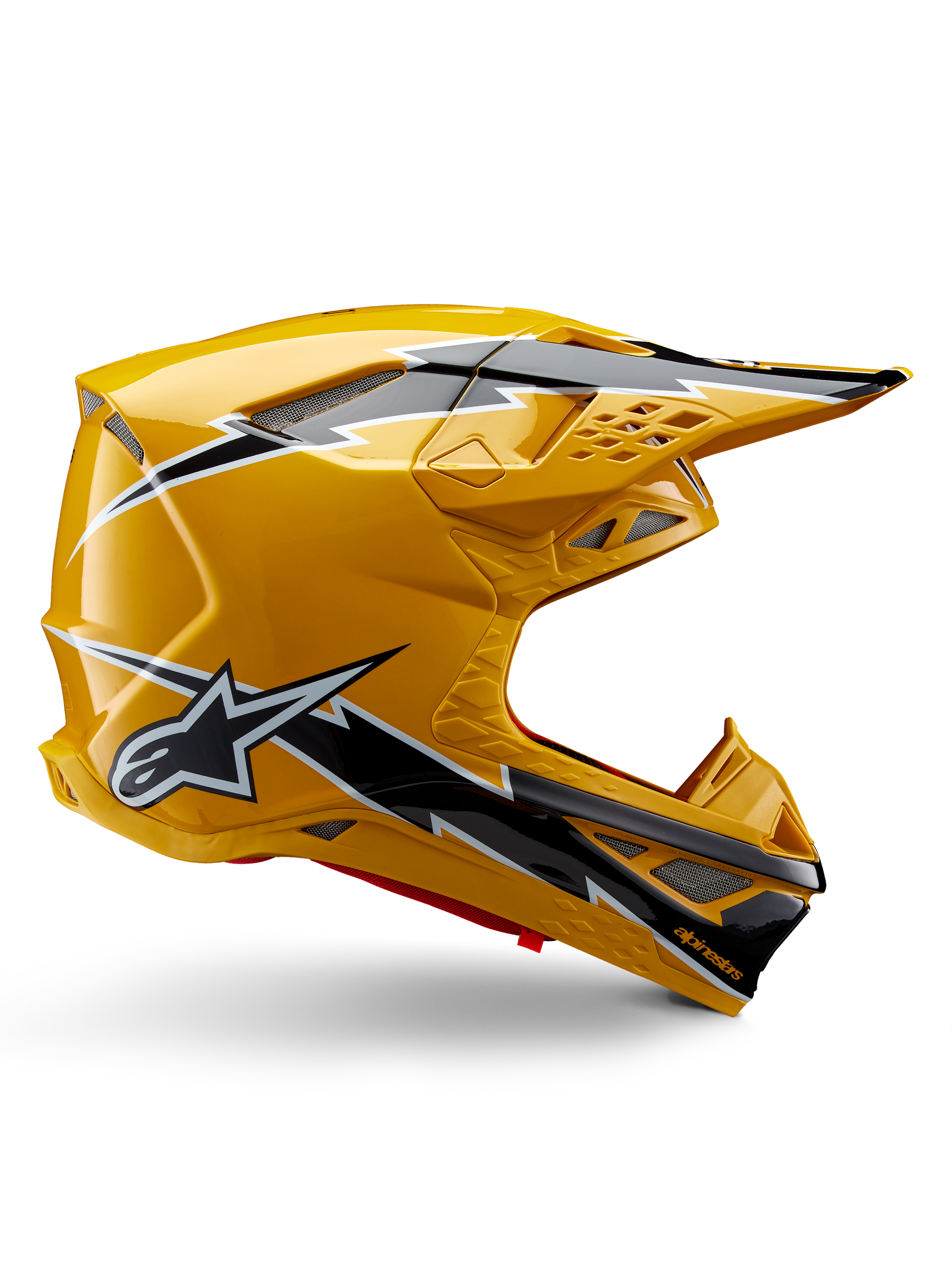Alpinestars Supertech M10 Ampress Helmet, Motocross Helmet, Black and Yellow Glossy, side profile showing bold black and white lightning graphics, Alpinestars star logo, aerodynamic design with integrated ventilation ports and adjustable visor.