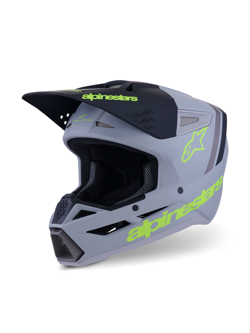 Kask Alpinestars S-M3 Radium, kask motocrossowy i enduro, szary, czarny i neonowo-żółty fluo matowy, widok pod kątem 3/4 pokazujący agresywny design skorupy, wentylowane wloty powietrza i wyraziste żółte logo