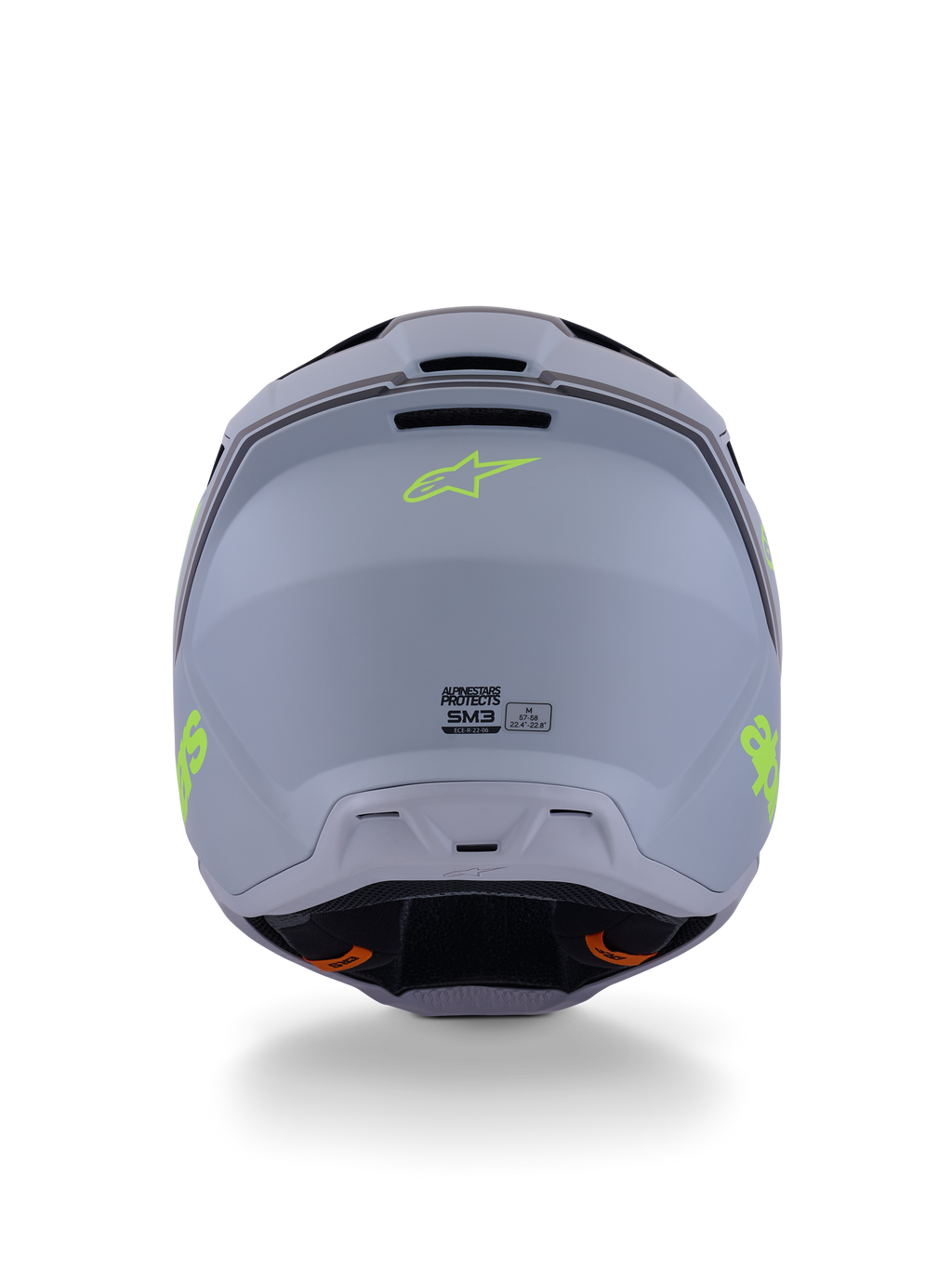 Kask Alpinestars S-M3 Radium, kask motocrossowy, zielony, czarny i żółty neonowy mat, widok z tyłu ukazujący matowe wykończenie skorupy, neonowożółte logo Alpinestars i szczegóły certyfikacji ECE 22.06