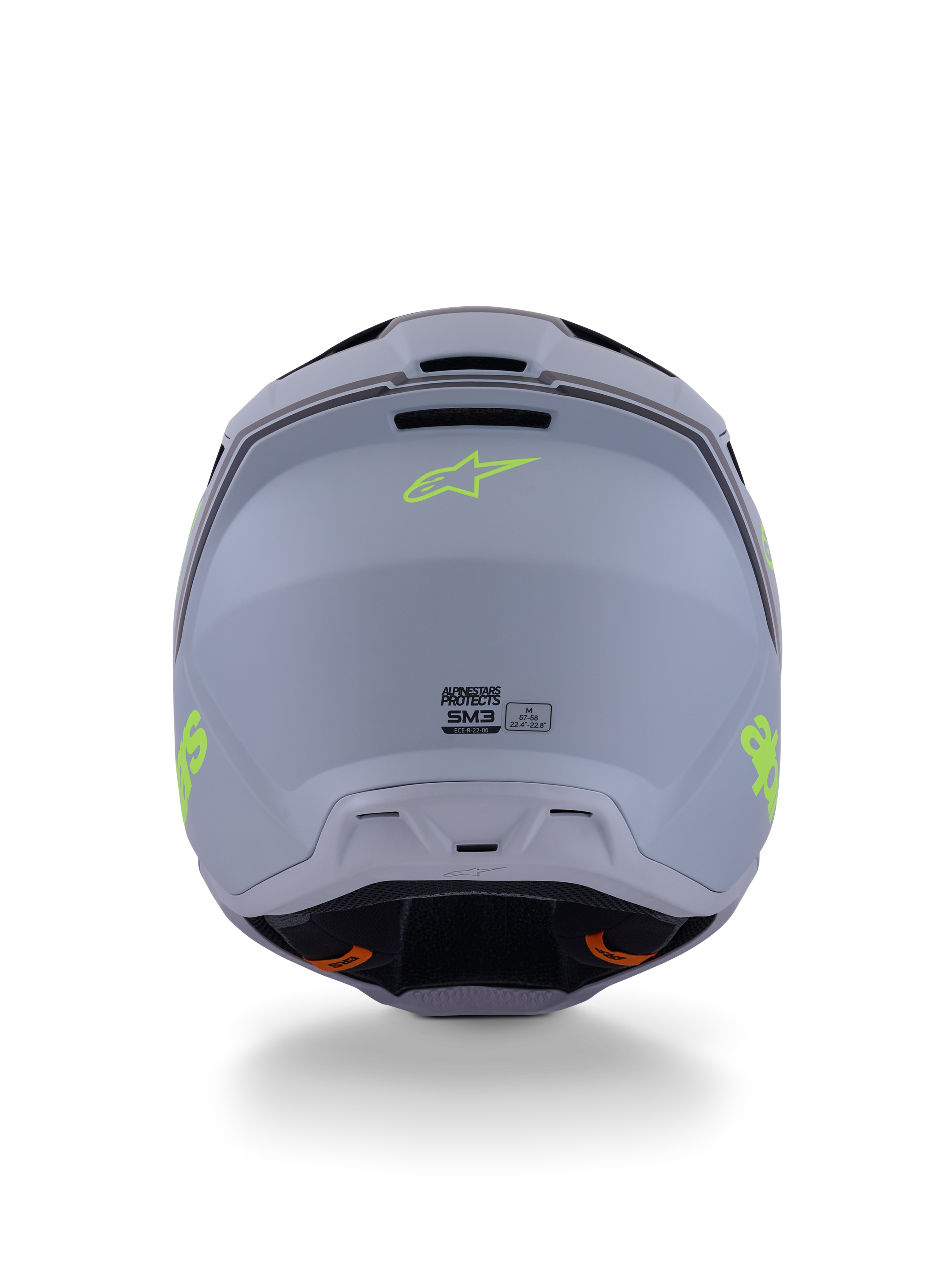 Kask Alpinestars S-M3 Radium, kask motocrossowy, zielony, czarny i żółty neonowy mat, widok z tyłu ukazujący matowe wykończenie skorupy, neonowożółte logo Alpinestars i szczegóły certyfikacji ECE 22.06