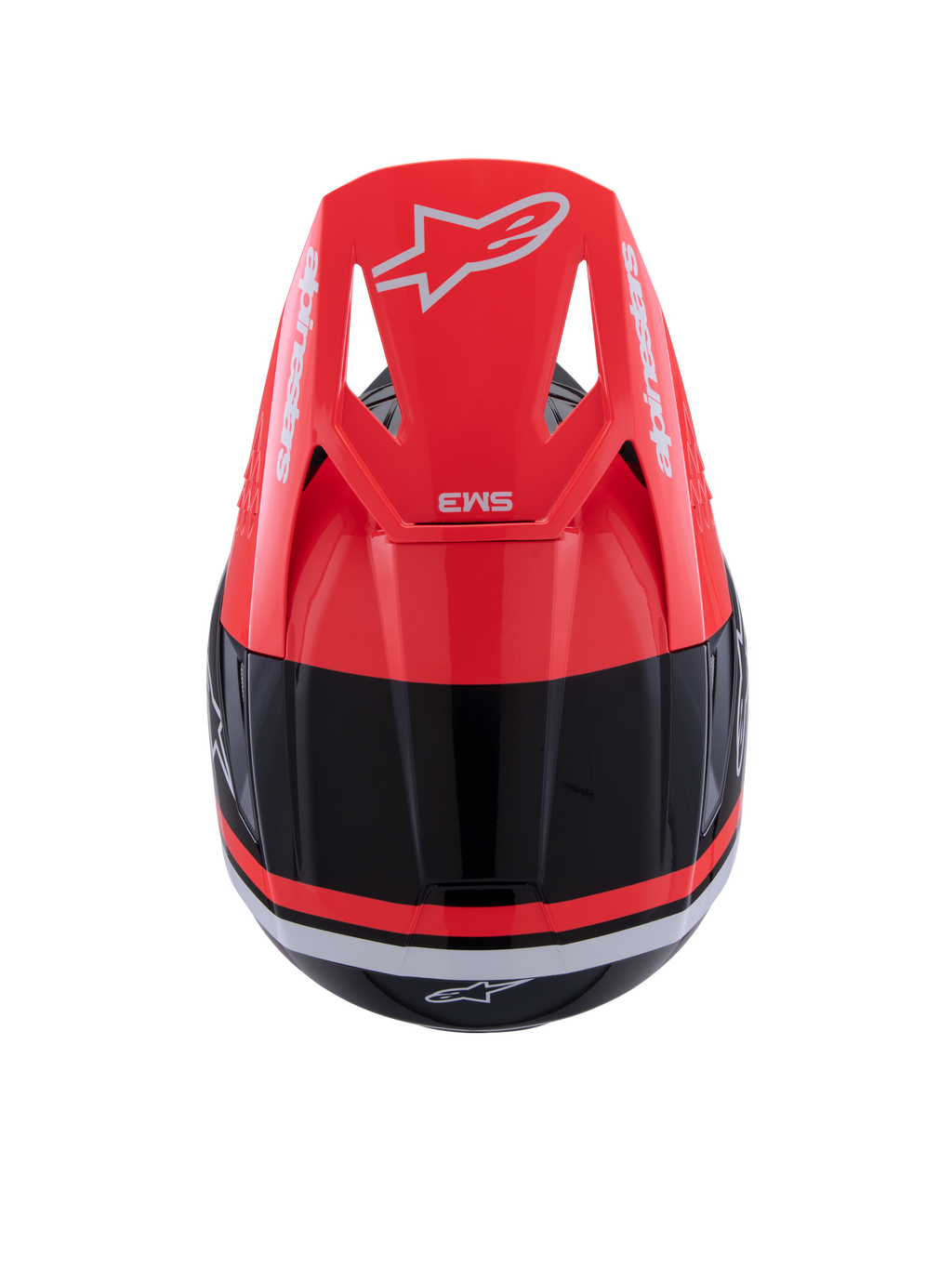 Kask Alpinestars S-M3 Radium, kask motocrossowy, czarny, czerwony fluo i biały połysk, widok z góry z daszkiem w kolorze czerwonym fluo z białym logo Alpinestars i smukłą aerodynamiczną konstrukcją