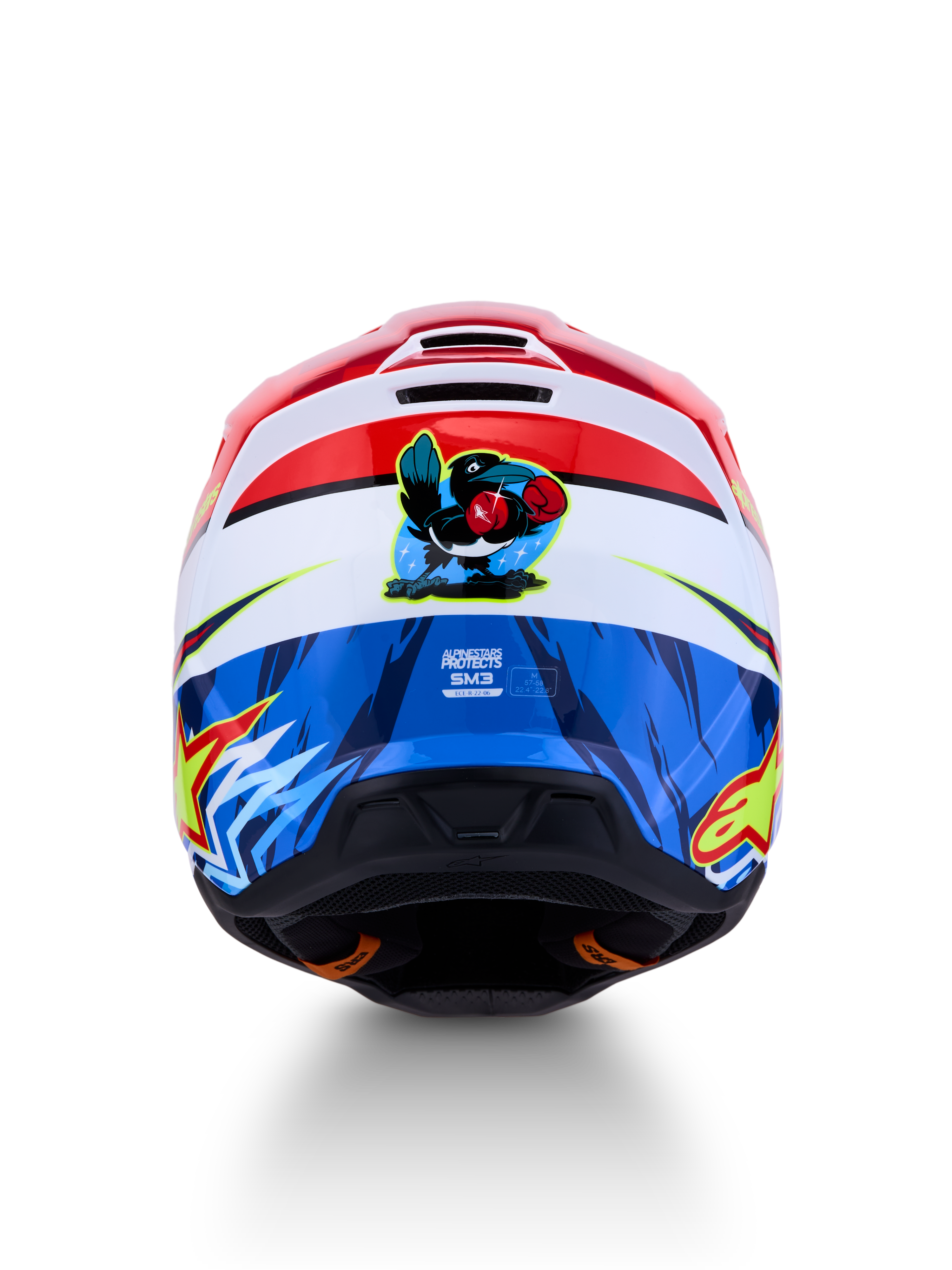 Kask Alpinestars SM3 Falcon ECE06, czerwono-niebieski kask motocrossowy z grafiką rysunkowego sokoła z tyłu.