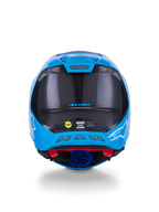 Kask Alpinestars Supertech M10 Flood, kask motocrossowy, metaliczny niebieski i średni niebieski z czarnym włóknem węglowym, widok z tyłu pokazujący teksturę karbonu 3K, białe logotypy gwiazdy, naklejka MIPS i wylotowe otwory wentylacyjne