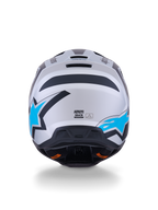 Kask Alpinestars S-M3 Heat, kask motocrossowy, srebrno-niebiesko-czarny mat, widok z tyłu ukazujący jasnoniebieskie logo z gwiazdą, matowe wykończenie i zintegrowane otwory wentylacyjne.