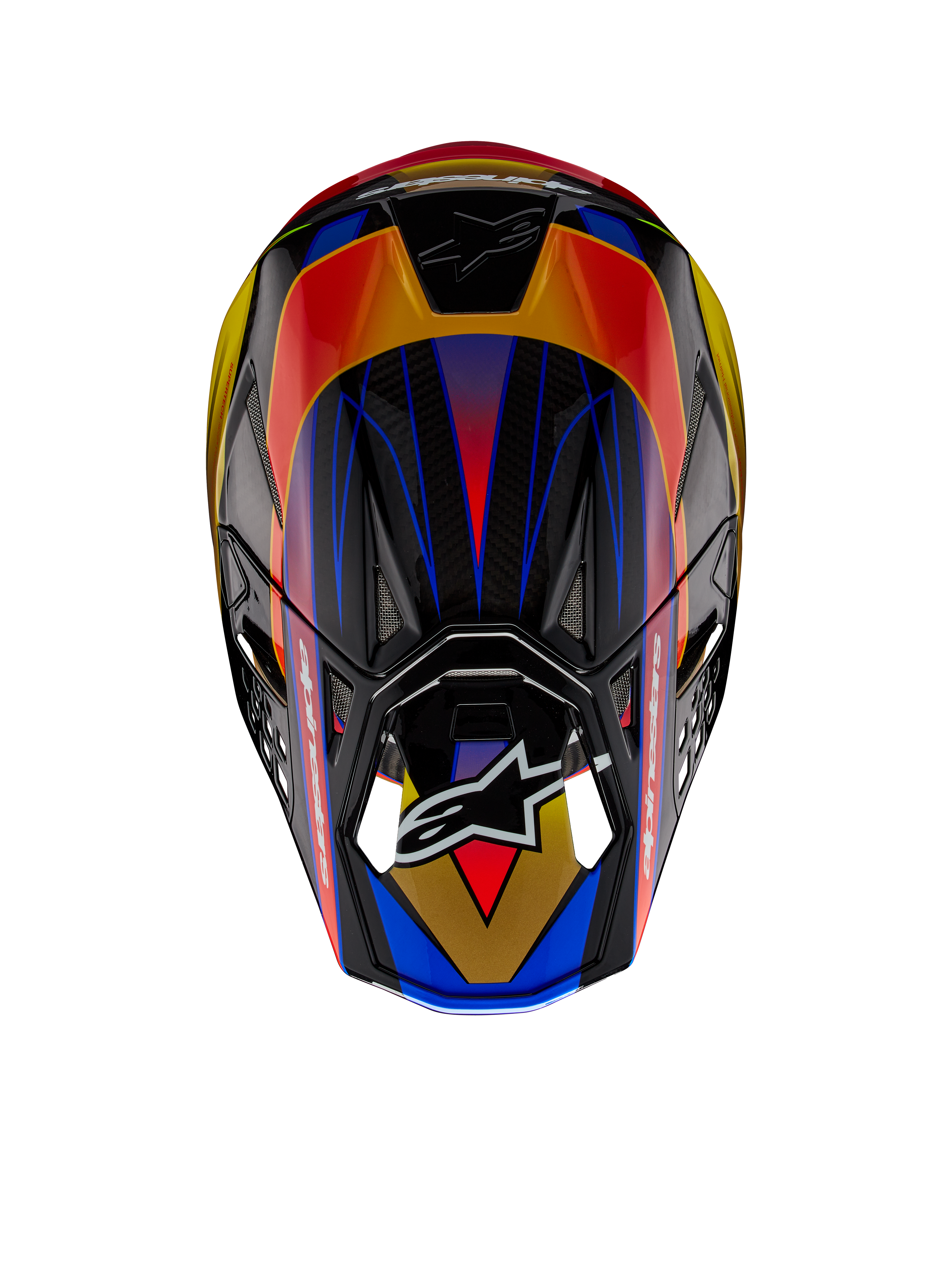 Kask Alpinestars Supertech M10 Era ECE, kask motocrossowy, złoty, żółty i czerwony połysk, widok z góry ukazujący żywe geometryczne wzory w kolorze niebieskim i żółtym, błyszczące wykończenie z widoczną teksturą karbonowej skorupy, logo Alpinestars na daszku