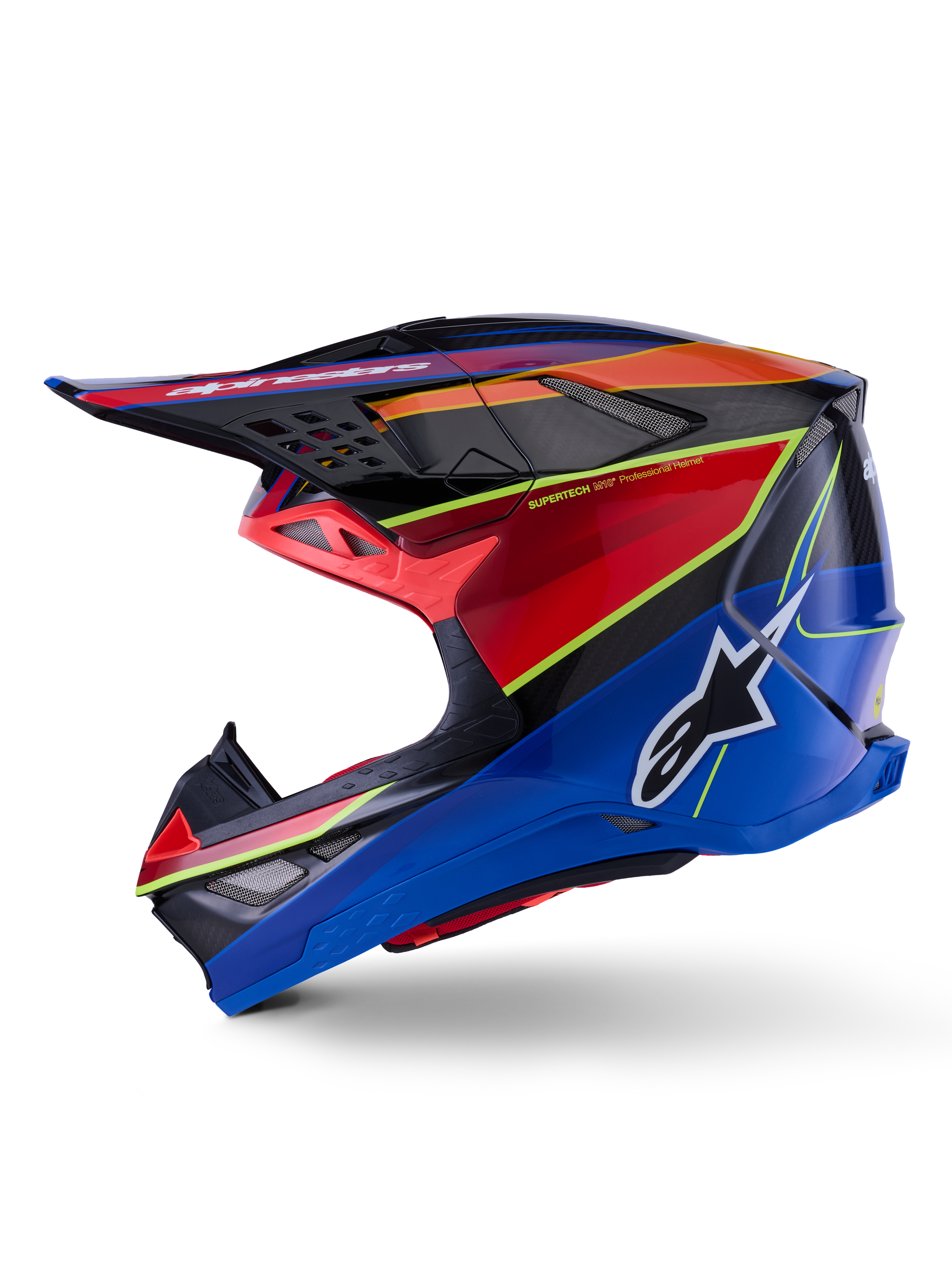 Alpinestars Supertech M10 Era Helmet, kask motocrossowy, niebieski, czerwony i żółty fluo z połyskiem, widok z boku z aerodynamiczną skorupą z włókna węglowego, wyraźne logo Alpinestars z boku, liczne otwory wentylacyjne, profesjonalny sprzęt do wyścigów terenowych