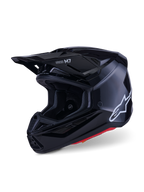 Alpinestars S-M7 Solid Helmet, kask motocrossowy, czarny z połyskiem, białe logo Alpinestars z boku, aerodynamiczny daszek i liczne otwory wentylacyjne zapewniające ochronę podczas wyścigów off-road