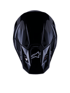 Alpinestars S-M7 Solid Helmet ECE 22.06, kask motocrossowy, czarny połysk, widok z góry przedstawiający aerodynamiczną skorupę kompozytową z logo Astars i brandingiem M7, smukły design z otworami wentylacyjnymi dla wydajności w wyścigach off-road