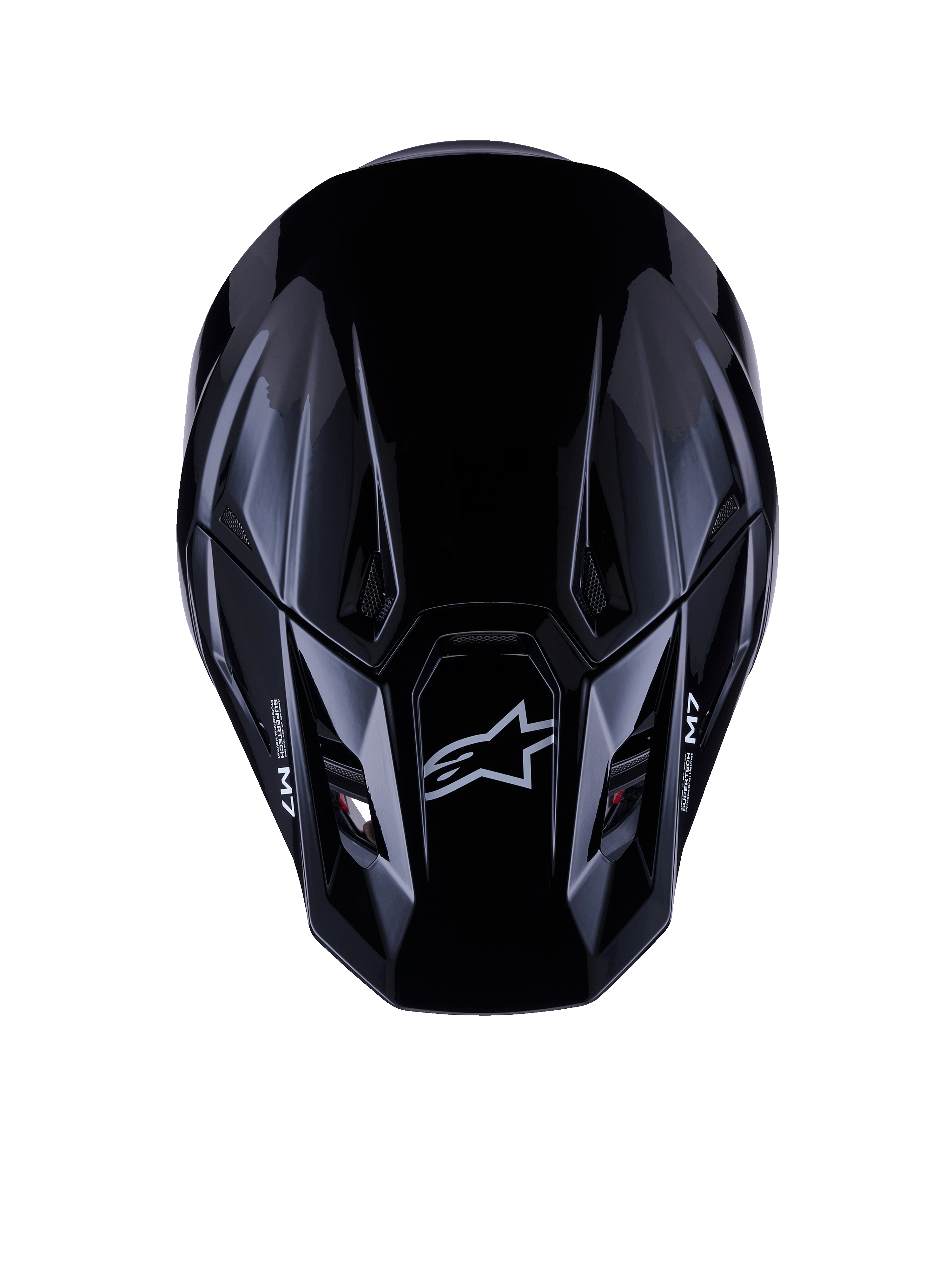Alpinestars S-M7 Solid Helmet ECE 22.06, kask motocrossowy, czarny połysk, widok z góry przedstawiający aerodynamiczną skorupę kompozytową z logo Astars i brandingiem M7, smukły design z otworami wentylacyjnymi dla wydajności w wyścigach off-road