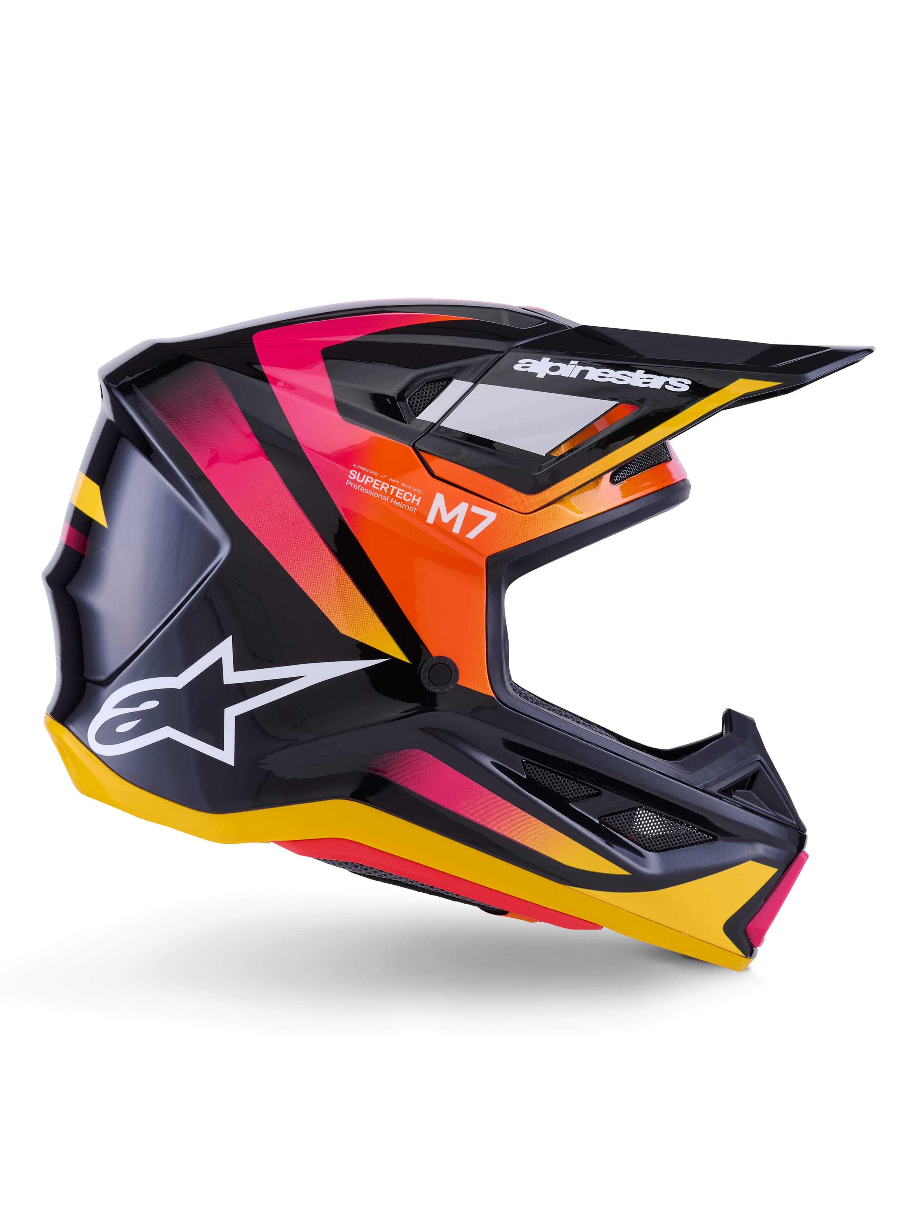 Alpinestars S-M7 Rise Helmet, kask motocrossowy, błyszczący czarny z różowymi, pomarańczowymi i żółtymi grafikami, widok z profilu, białe logo Alpinestars i daszek, aerodynamiczna skorupa ze zintegrowanymi otworami wentylacyjnymi