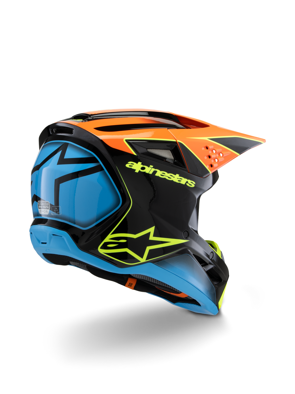 Alpinestars S-M3 Youth Fray Helmet, kask motocrossowy, czarny, pomarańczowy i niebieski z neonowożółtymi akcentami, widok z tyłu pod kątem trzech czwartych pokazujący wyraźne logo Alpinestars i symbol gwiazdy, smukły aerodynamiczny design do młodzieżowych wyścigów terenowych