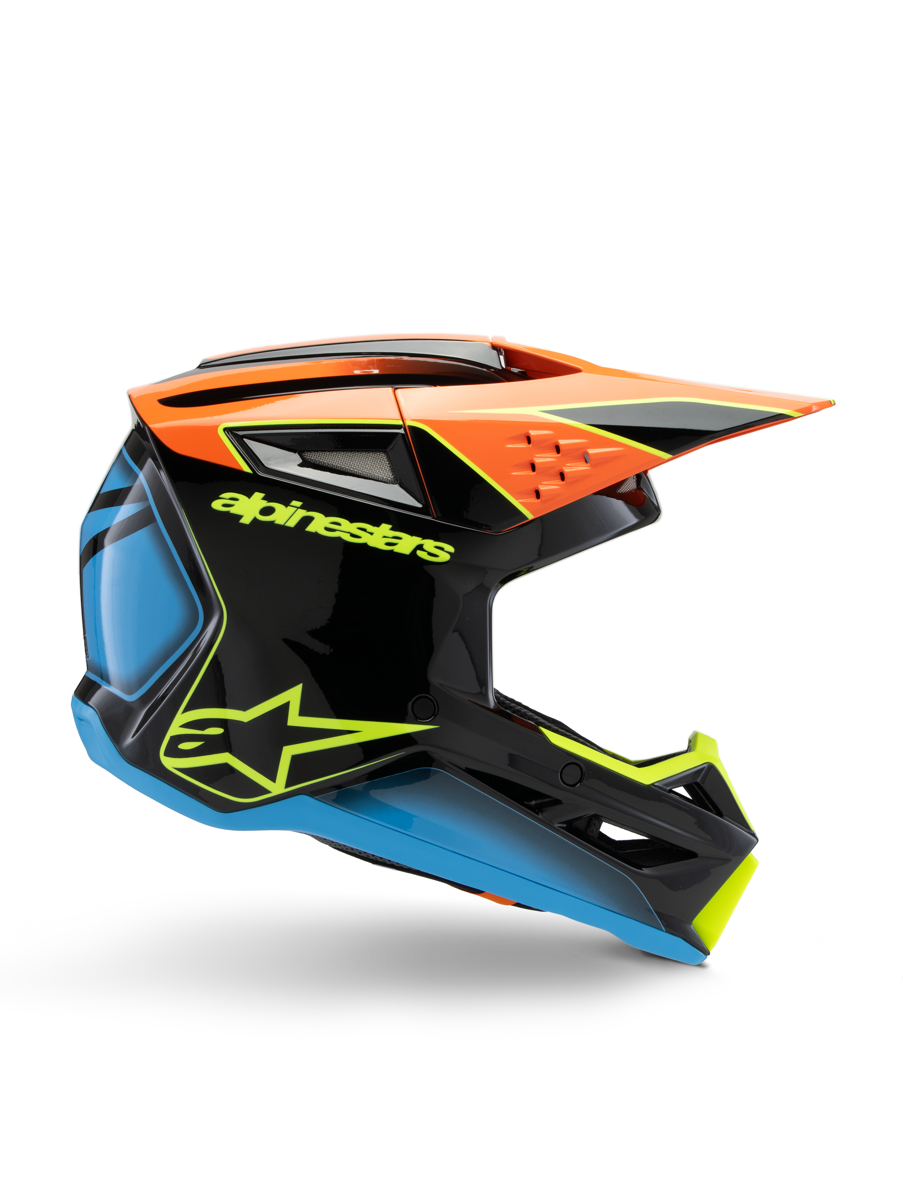 Alpinestars S-M3 Youth Fray Helmet, kask motocrossowy młodzieżowy, czarny z pomarańczowymi, niebieskimi i żółtymi neonowymi akcentami, widok z profilu bocznego ukazujący aerodynamiczny design, otwory wentylacyjne i ostry daszek, błyszczące wykończenie z wyrazistym żółtym logo.