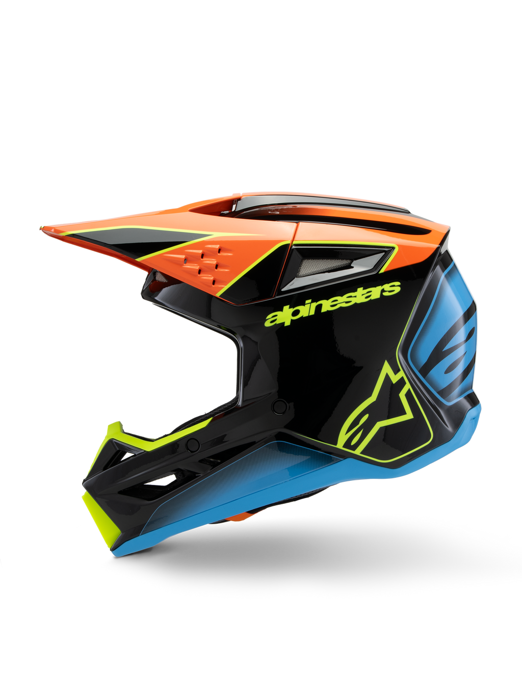 Kask Alpinestars S-M3 Youth Fray, kask motocrossowy, czarny z pomarańczowymi, żółtymi i niebieskimi akcentami, widok z boku, wyraźny branding Alpinestars, agresywna stylistyka z dużym daszkiem i otworami wentylacyjnymi, lśniący sprzęt ochronny dla młodych motocyklistów off-road