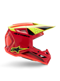 Alpinestars S-M3 Youth Fray Helmet, Motocross Helmet, Red Yellow Fluo and Black Glossy, side profile view showing a sleek aerodynamic design with integrated visor and prominent air vents, bold black branding on a vibrant red shell, optimized for youth off-road performance