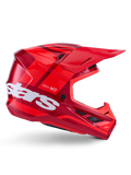 Kask Alpinestars S-M7 Core, kask motocrossowy, błyszczący czerwony z ciemnoczerwonymi akcentami i białym brandingiem, widok z boku z dużym białym logo stars, aerodynamiczna skorupa z siatkowymi otworami wentylacyjnymi i wyraźnym daszkiem