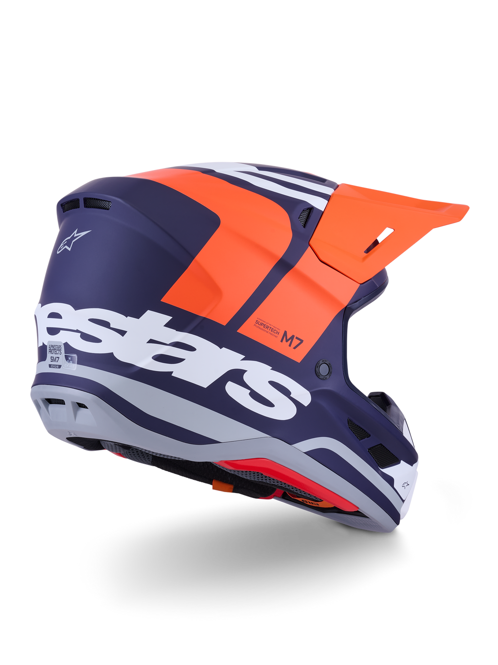 Kask Alpinestars S-M7 Core, kask motocrossowy, pomarańczowo-niebieski mat, widok z tyłu i z boku z wyraźnym białym logo Alpinestars z tyłu, jaskrawopomarańczowy daszek, aerodynamiczna skorupa kompozytowa z szarymi akcentami, profesjonalna ochrona do wyścigów off-road