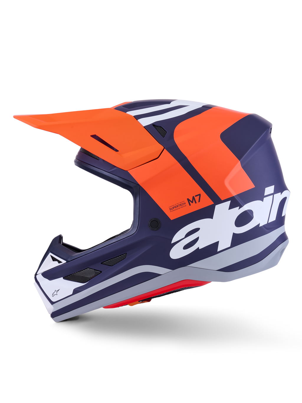 Alpinestars S-M7 Core Helmet ECE 22.06, profil boczny, granatowo-pomarańczowe matowe wykończenie, duże białe logo z boku, aerodynamiczny kask motocrossowy z daszkiem ochronnym