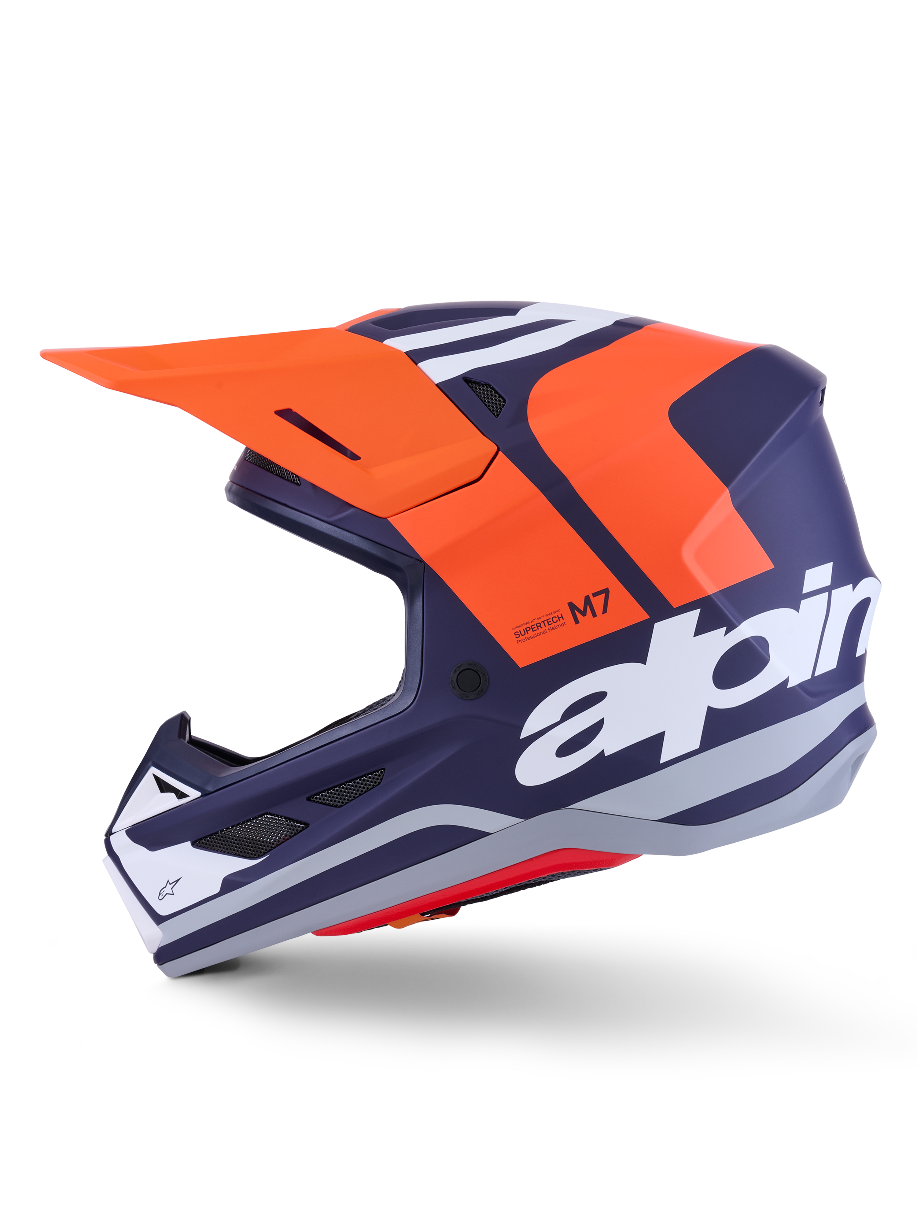 Alpinestars S-M7 Core Helmet ECE 22.06, profil boczny, granatowo-pomarańczowe matowe wykończenie, duże białe logo z boku, aerodynamiczny kask motocrossowy z daszkiem ochronnym