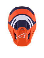 Kask Alpinestars S-M7 Core ECE 22.06, kask motocrossowy, pomarańczowy i niebieski matowy, widok z góry pokazujący granatowe i białe grafiki geometryczne, białe logo Alpinestars na pomarańczowym daszku, aerodynamiczna konstrukcja skorupy do wyścigów off-road