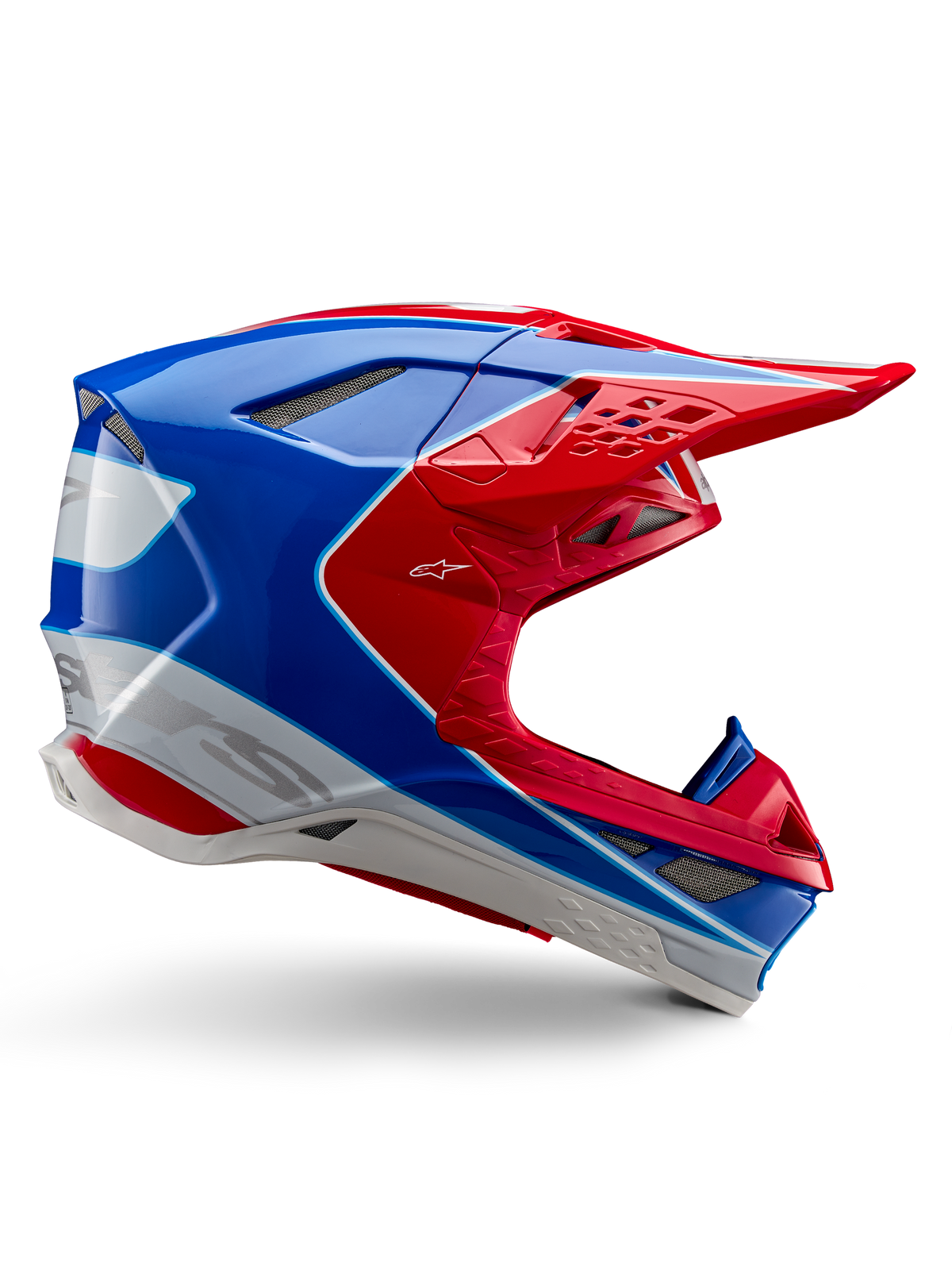 Alpinestars Supertech M10 Aeon Helmet, kask motocrossowy, jaskrawoczerwony, niebieski i biały, błyszczące wykończenie, aerodynamiczny profil boczny z licznymi otworami wentylacyjnymi z siatką, kanciaste kontury i daszek