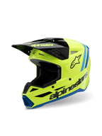 Kask Alpinestars S-M3 Youth Radium, kask motocrossowy, żółty fluo, czarny i niebieski, czarny daszek, wyraźne logo Alpinestars z boku, niebieskie akcenty, wysokiej klasy sprzęt ochronny dla młodych motocyklistów