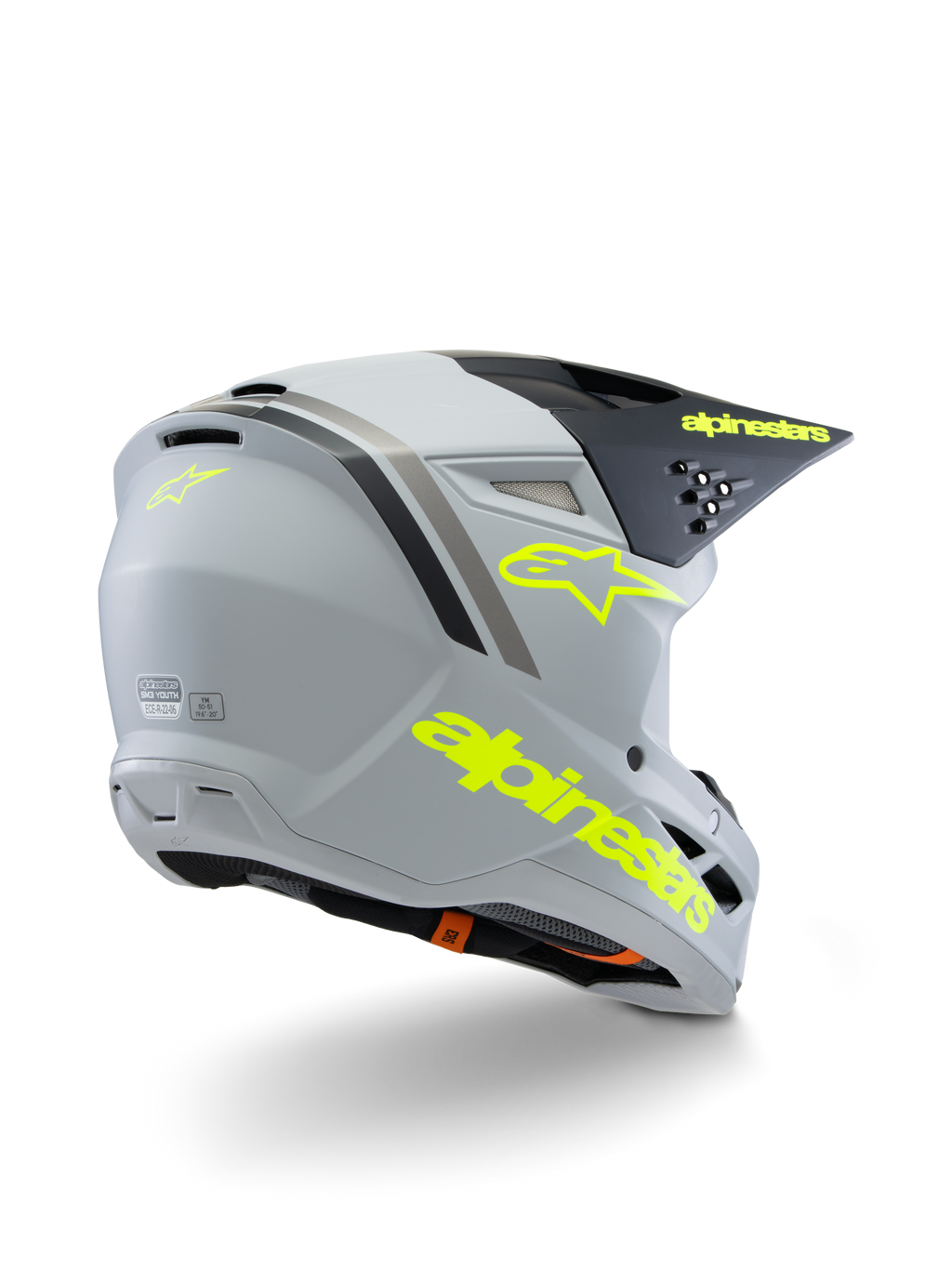 Alpinestars S-M3 Youth Radium Helmet ECE 22.06, kask motocrossowy, szaro-czarny i żółty neonowy mat, widok z tyłu pod kątem trzech czwartych pokazujący wyraźne żółte logo i znak gwiazdy, smukła aerodynamiczna skorupa z wentylacją do jazdy off-road