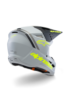 Alpinestars S-M3 Youth Radium Helmet ECE 22.06, kask motocrossowy, szaro-czarny i żółty neonowy mat, widok z tyłu pod kątem trzech czwartych pokazujący wyraźne żółte logo i znak gwiazdy, smukła aerodynamiczna skorupa z wentylacją do jazdy off-road