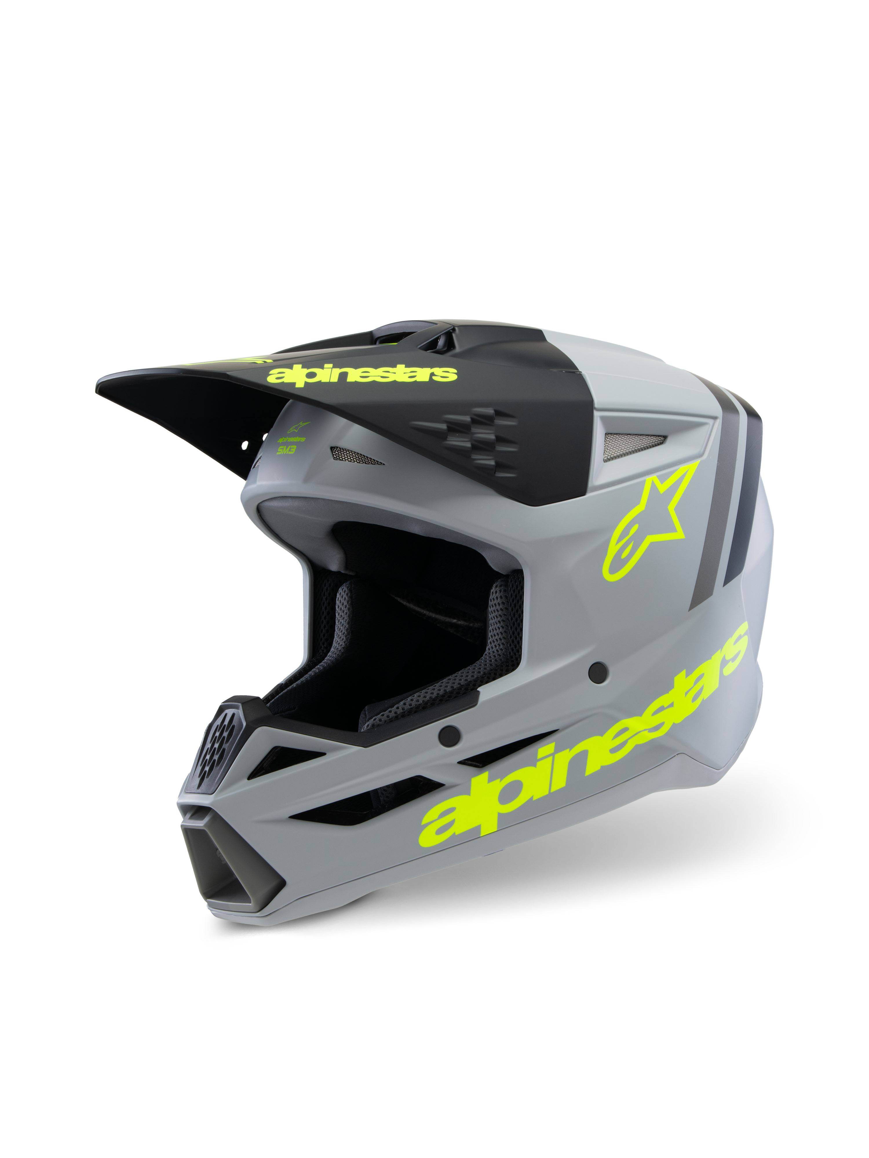 Kask Alpinestars S-M3 Youth Radium ECE 22.06, kask motocrossowy, matowy szary i czarny z fluorescencyjnymi żółtymi akcentami, wyraźne logo Alpinestars i logo gwiazdy, młodzieżowy sprzęt ochronny off-road