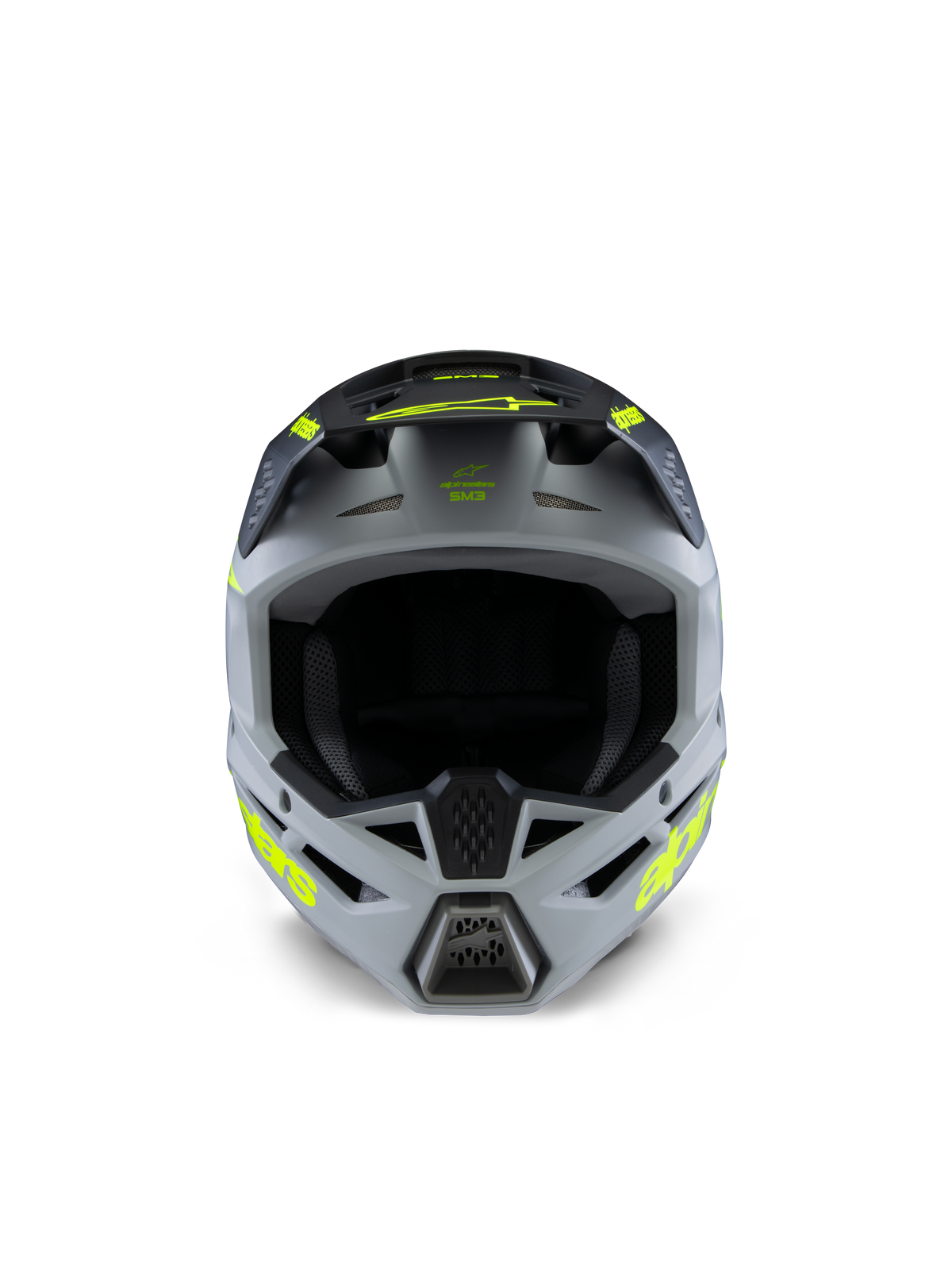 Alpinestars S-M3 Youth Radium Helmet, kask motocrossowy, szary, czarny i żółty neonowy matowy, widok z przodu przedstawiający agresywną kanciastą skorupę, jaskrawożółte logotypy na bokach i daszku, matowe wykończenie stworzone do młodzieżowych wyścigów off-road i MX
