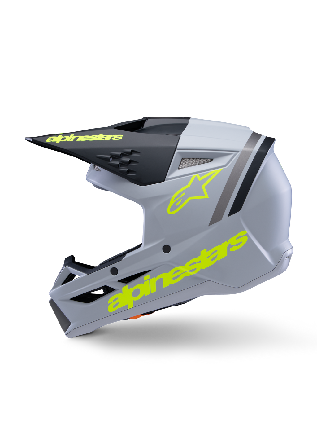 Alpinestars S-M3 Youth Radium Helmet ECE 22.06, kask motocrossowy, szary, czarny i żółty neonowy mat, widok z boku z żółtymi fluorescencyjnymi logotypami Alpinestars i czarnym daszkiem, aerodynamiczny sprzęt ochronny dla młodych zawodników