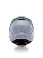Alpinestars S-M3 Youth Radium Helmet ECE 22.06, kask motocrossowy młodzieżowy, szary, czarny i żółty fluorescencyjny mat, widok z tyłu ukazujący otwory wentylacyjne i etykiety certyfikacyjne, fluorescencyjne żółte logo gwiazdy, aerodynamiczna konstrukcja skorupy