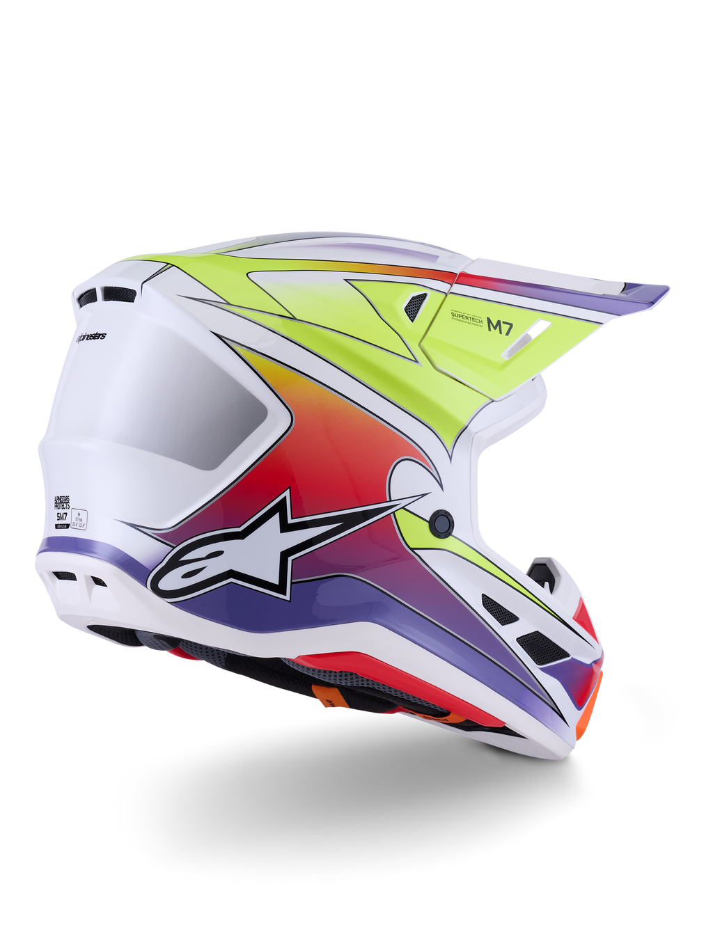 Kask Alpinestars S-M7 Fuse, kask motocrossowy, biały, żółty fluo i fioletowy połysk, żywa wielokolorowa grafika z gradientem i wyraźnym czarno-białym logo gwiazdy, aerodynamiczna skorupa kompozytowa ze zintegrowanymi otworami wentylacyjnymi, przeznaczony do wyścigów terenowych