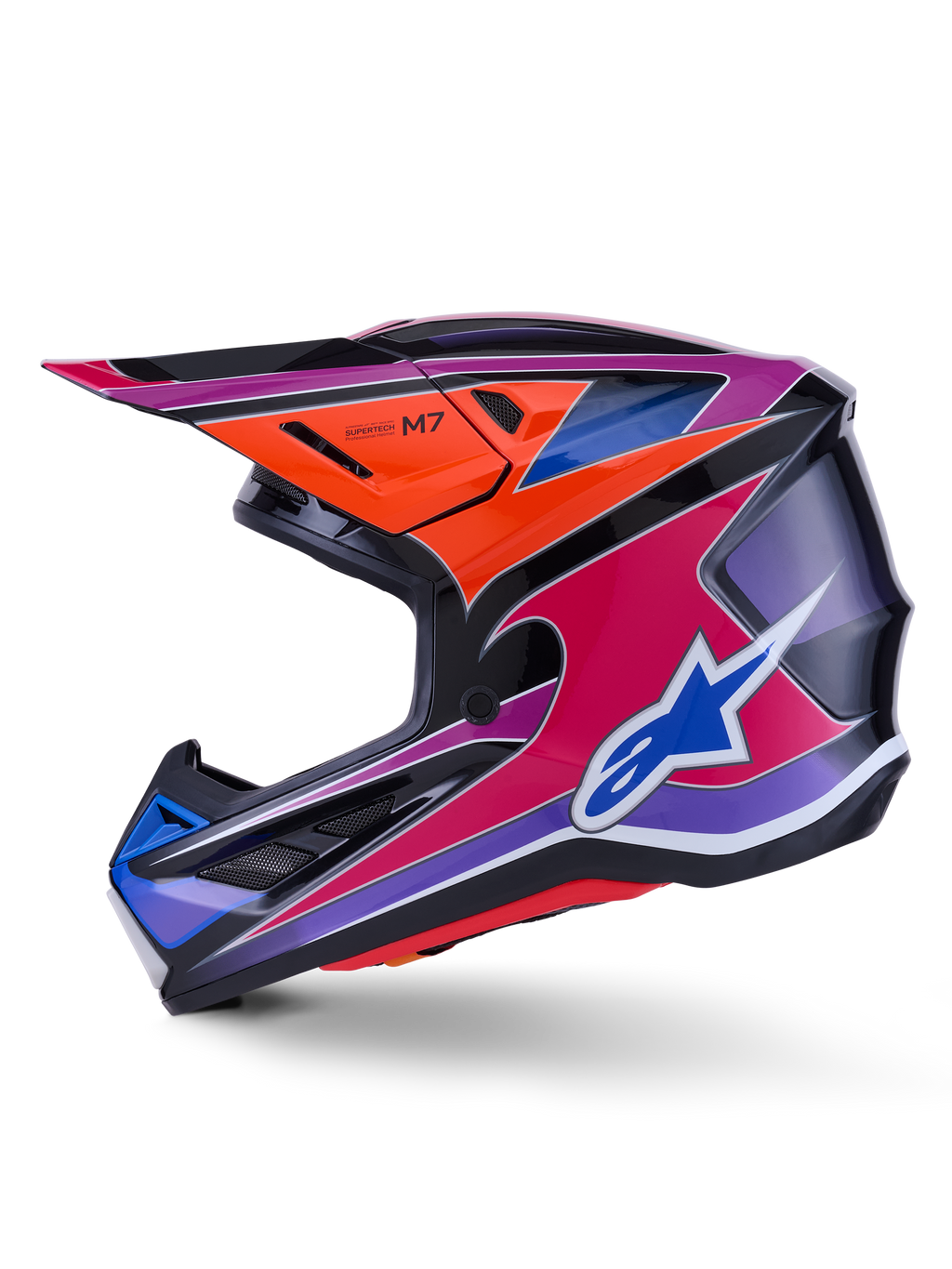 Kask Alpinestars S-M7 Fuse, kask motocrossowy, błyszczący niebieski, fioletowy, różowy i pomarańczowy, żywy wielokolorowy wzór graficzny z niebieskim logo Alpinestars, aerodynamiczna skorupa kompozytowa z daszkiem ochronnym i otworami wentylacyjnymi, profesjonalny sprzęt do wyścigów off-road