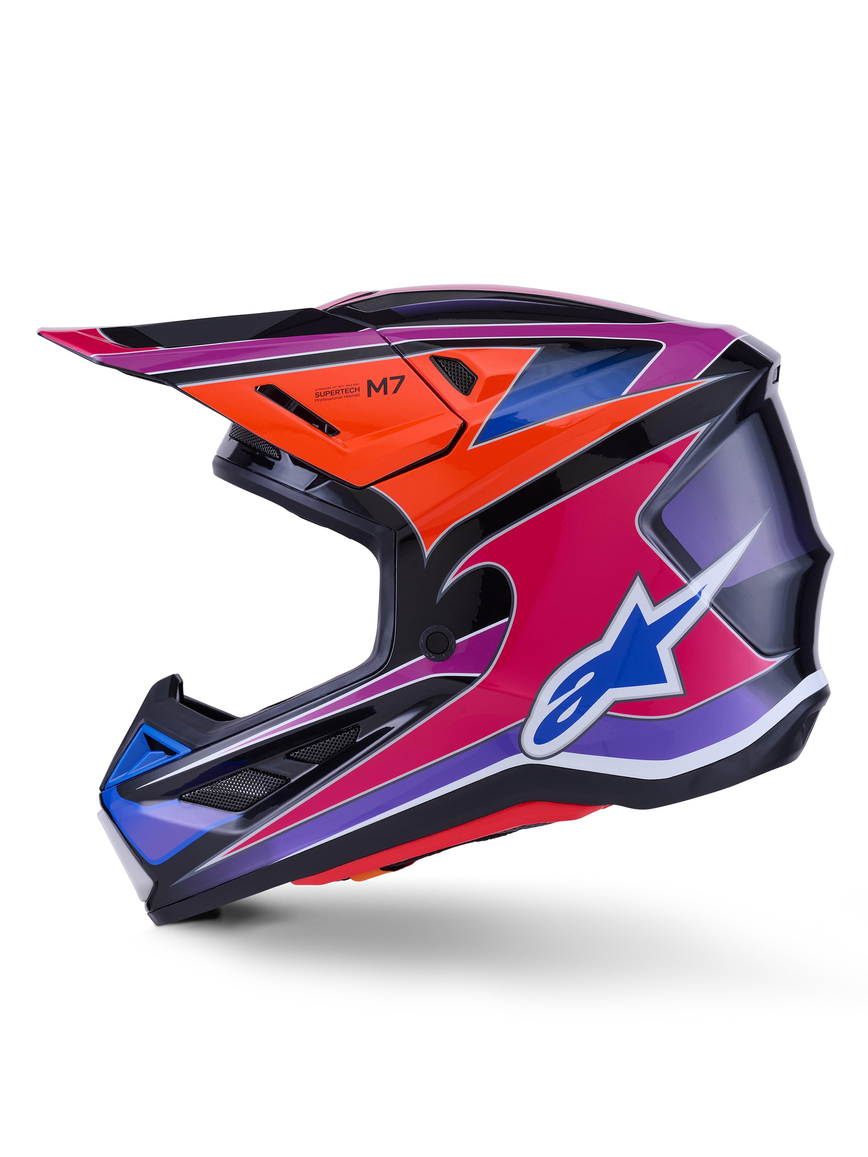 Kask Alpinestars S-M7 Fuse, kask motocrossowy, błyszczący niebieski, fioletowy, różowy i pomarańczowy, żywy wielokolorowy wzór graficzny z niebieskim logo Alpinestars, aerodynamiczna skorupa kompozytowa z daszkiem ochronnym i otworami wentylacyjnymi, profesjonalny sprzęt do wyścigów off-road