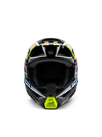 Młodzieżowy kask Alpinestars S-M3 Youth Wurx, widok z przodu, czarny z neonowożółtymi, niebieskimi i czerwonymi akcentami, młodzieżowy sprzęt ochronny do motocrossu, czarna baza z wyrazistymi grafikami geometrycznymi, zintegrowane otwory wentylacyjne i żółta osłona podbródka, styl wyścigowy off-road