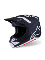 Kask Alpinestars S-M7 Dasher, kask motocrossowy, czarny i biały mat z czerwonymi akcentami, z wyrazistymi białymi logotypami i grafikami Alpinestars, aerodynamiczna skorupa kompozytowa ze zintegrowanymi otworami wentylacyjnymi i ochronnym daszkiem.