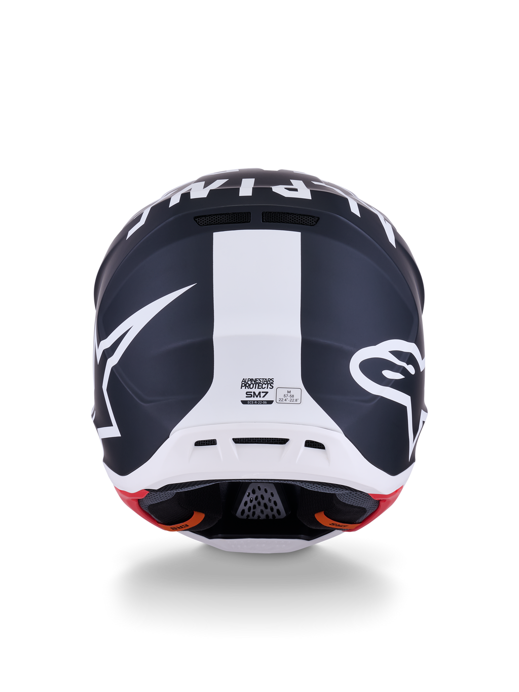 Kask Alpinestars S-M7 Dasher, kask motocrossowy, czarny matowy i biały z czerwonymi akcentami, widok z tyłu z wyraźnym logo gwiazdy i centralnym białym pasem, aerodynamiczny design do wyścigów off-road
