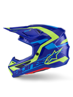 Kask Alpinestars S-M7 Deed, kask motocrossowy, niebieski i żółty neonowy połysk, widok z boku, smukła aerodynamiczna kompozytowa skorupa z jaskrawymi żółtymi i jasnoniebieskimi grafikami, otwory wentylacyjne osłonięte siatką i daszek zapewniający wydajność w terenie