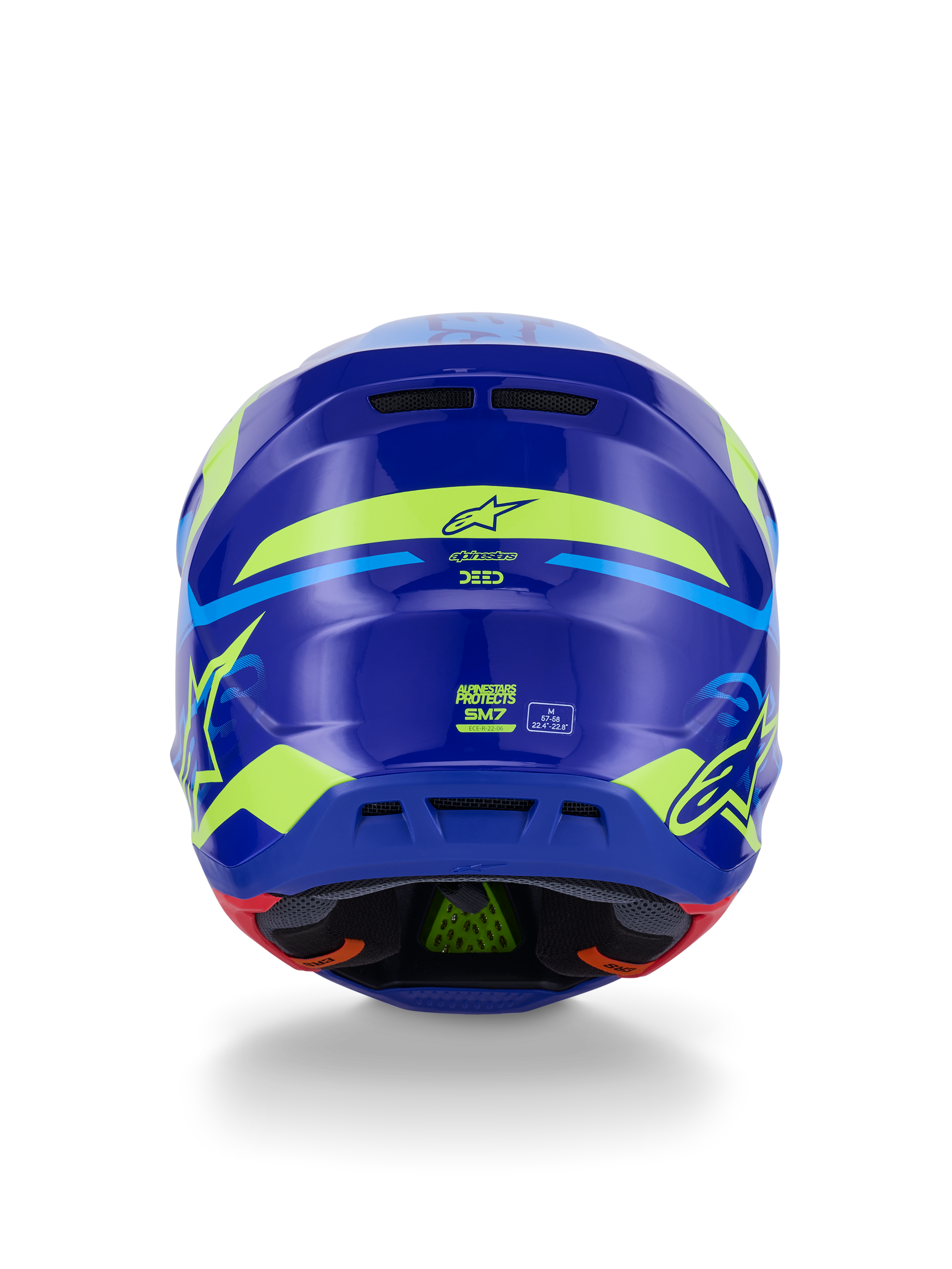 Alpinestars S-M7 Deed Helmet ECE 22.06, kask motocrossowy, widok z tyłu, niebiesko-żółty fluo połysk, z wyrazistymi fluorescencyjnymi żółtymi grafikami i logo gwiazdy, tylne otwory wylotowe, widoczna wewnętrzna wyściółka z zieloną technologią PLASMA.