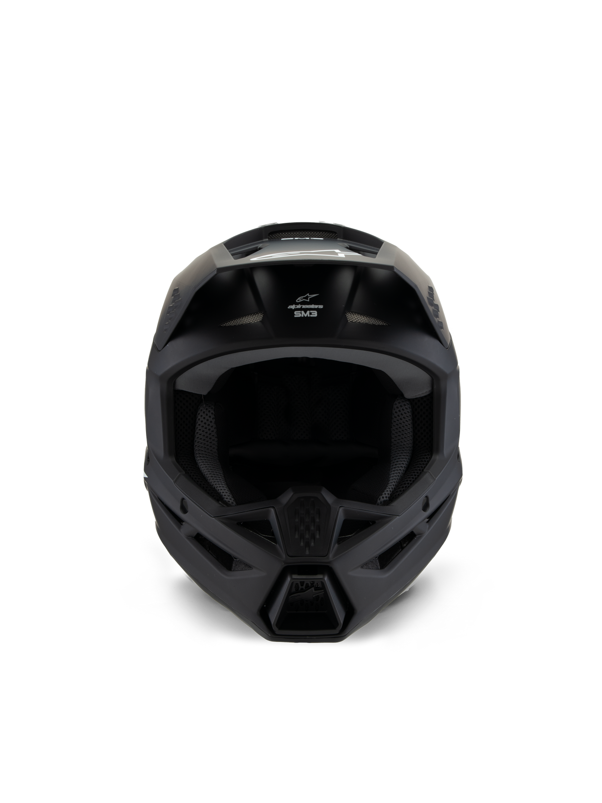 Młodzieżowy kask Alpinestars S-M3 Solid, kask motocrossowy, czarny mat, widok z przodu, z matowym wykończeniem, otwory wentylacyjne na szczęce i czole, białe logo SM3, smukła aerodynamiczna konstrukcja do wyścigów off-road