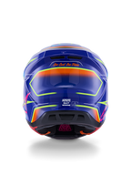 Alpinestars S-M7 Cast Helmet ECE 22.06, kask motocrossowy, niebieski, różowy i żółty fluo w połysku, widok z tyłu pokazujący slogan „One Goal. One Vision.”, aerodynamiczna kompozytowa skorupa ze zintegrowanymi otworami wentylacyjnymi i jaskrawymi neonowymi akcentami
